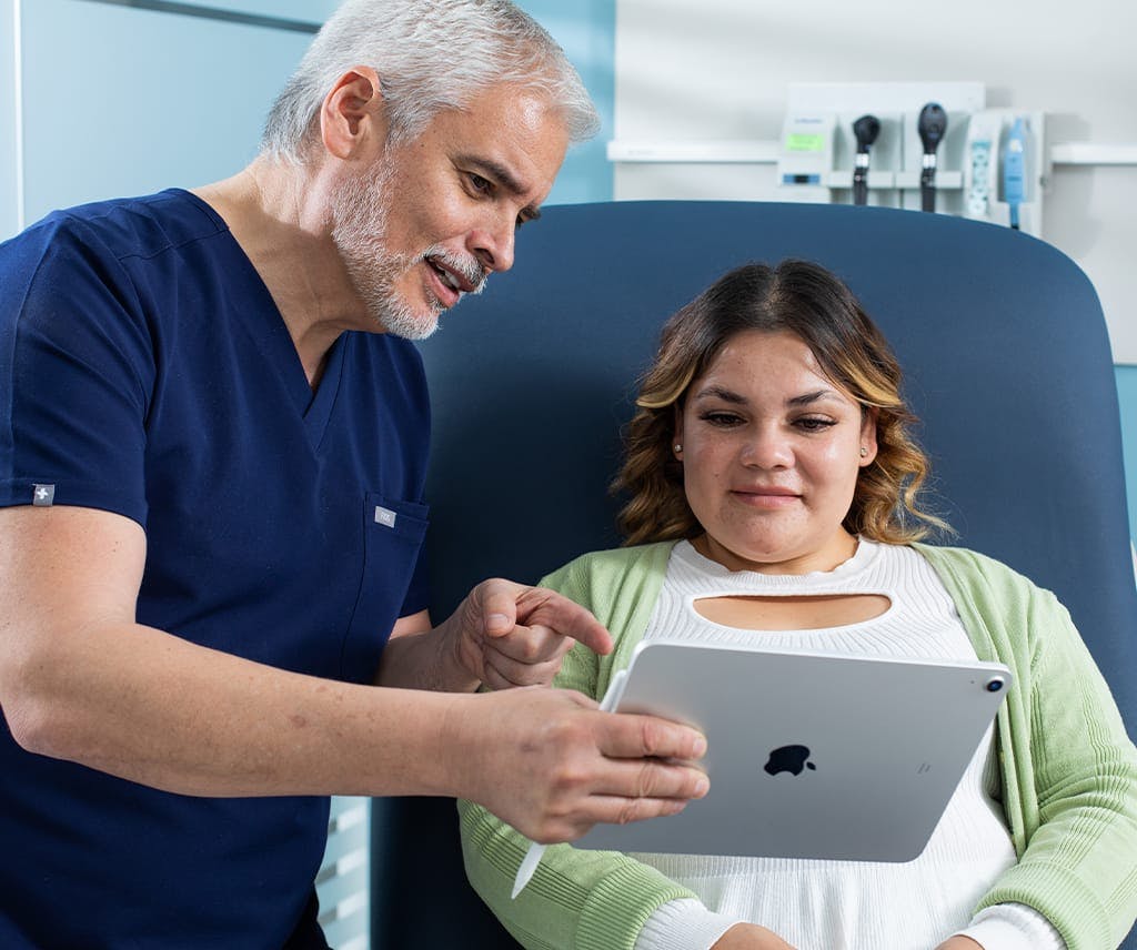 Dr. Ortiz with a patient