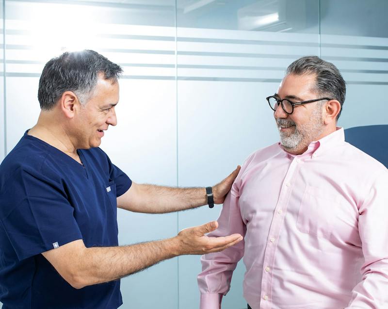 Doctor speaking with patient about weight loss surgery