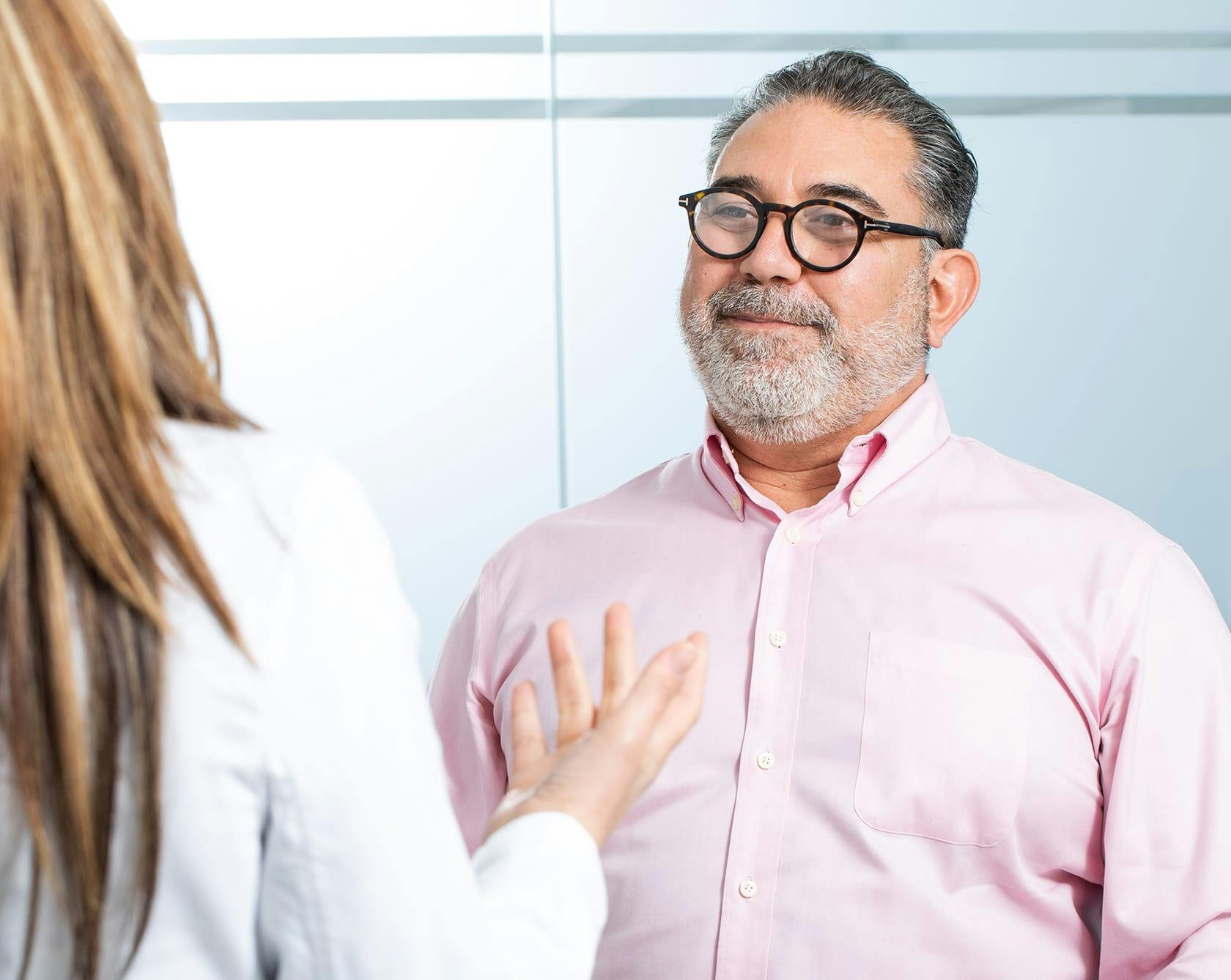 Man with Pink Shirt and Glasses