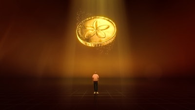 Man standing beneath a giant gold coin floating above his head