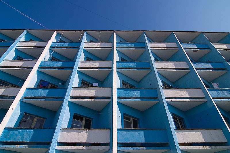 Blue building with many windows