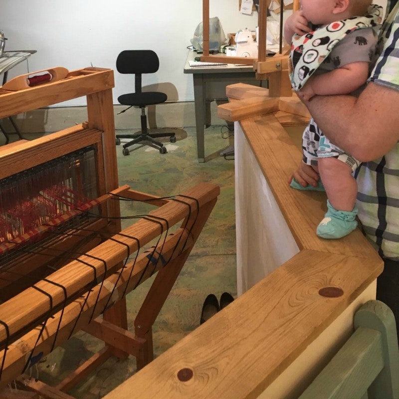 baby watching weaving
