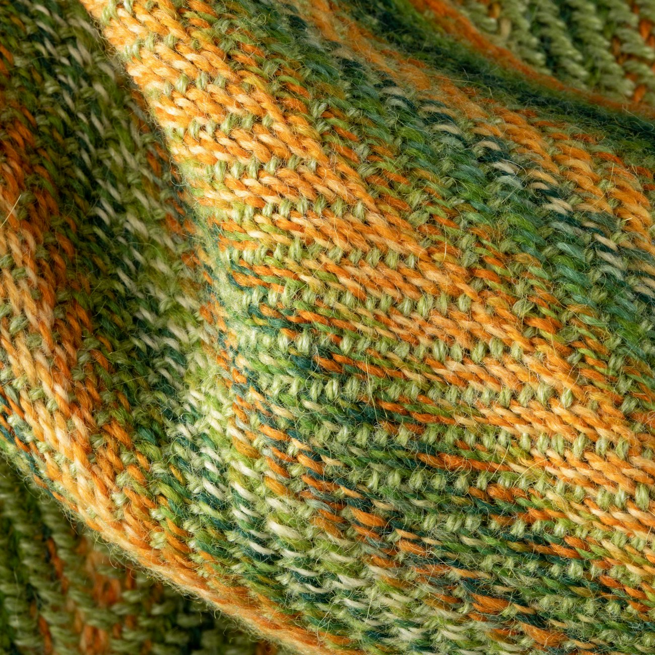 A close up of Nancy Peck's Double Faced Herringbone Scarf Little Looms 2021