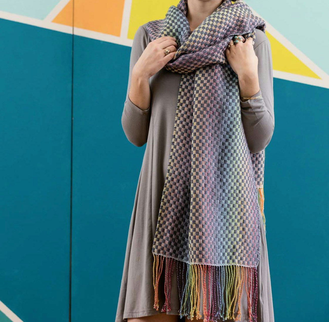 Sara Bixler's Rainbow Connection Shawl from the 2017 Easy Weaving With Little Looms is an example of iridescence creating on a rigid-heddle loom. Photo Credit: George Boe