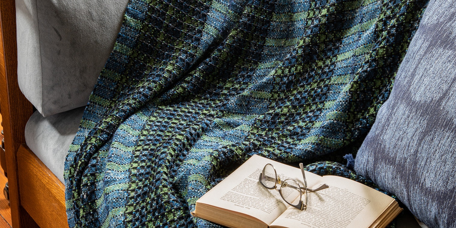 The whole is more than the sum of the parts in this cozy, squishy blanket woven in five panels on a rigid-heddle loom. From Easy Weaving with Little Looms Winter 2022. Photo Credit: Matt Graves