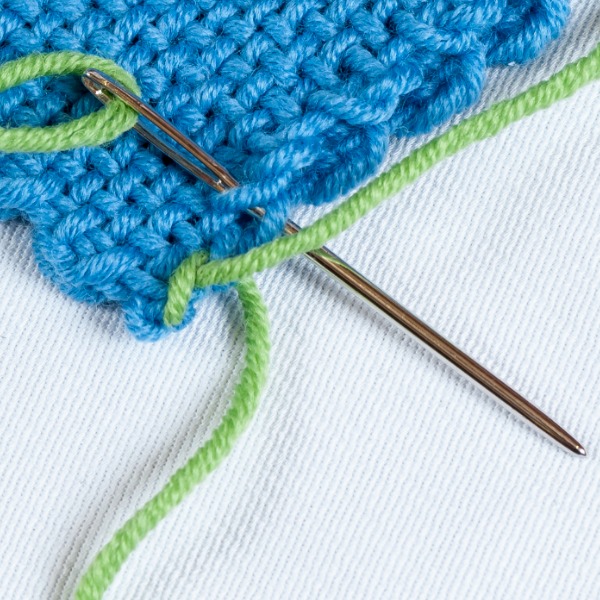 Learn how to join your squares with the whipstitch.