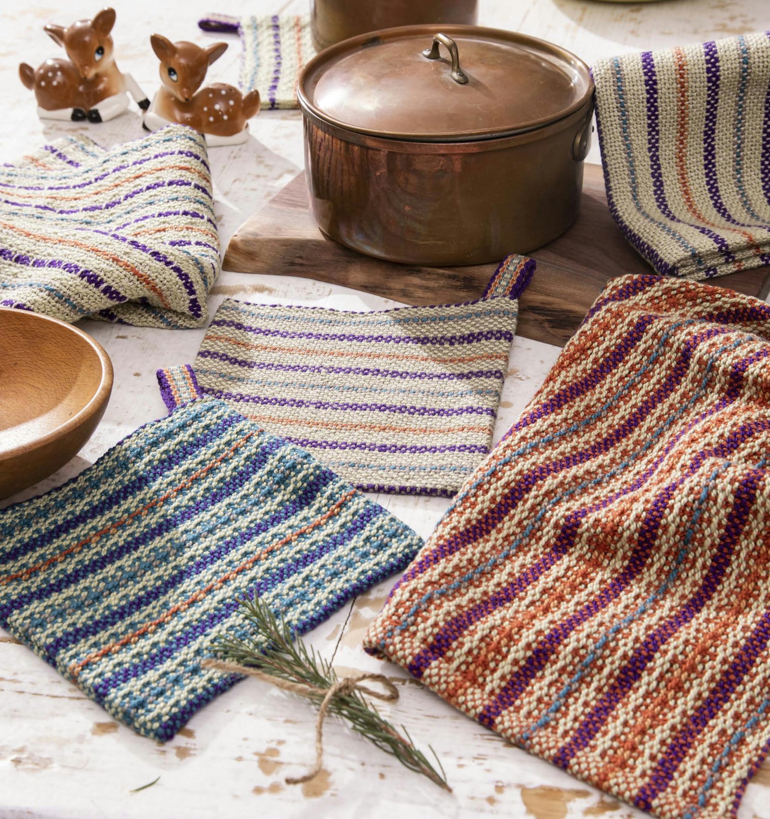 For her Mix and Match Kitchen Set in the Fall 2023 issue, Malynda Allen wove all her projects using the same striped warp but took a different weft approach for each one. Photo by Matt Graves