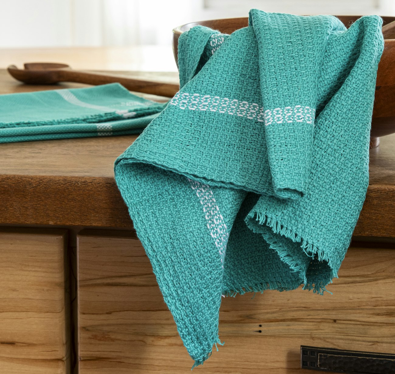 Teal towels (plain weave in background, waffle weave in foreground)