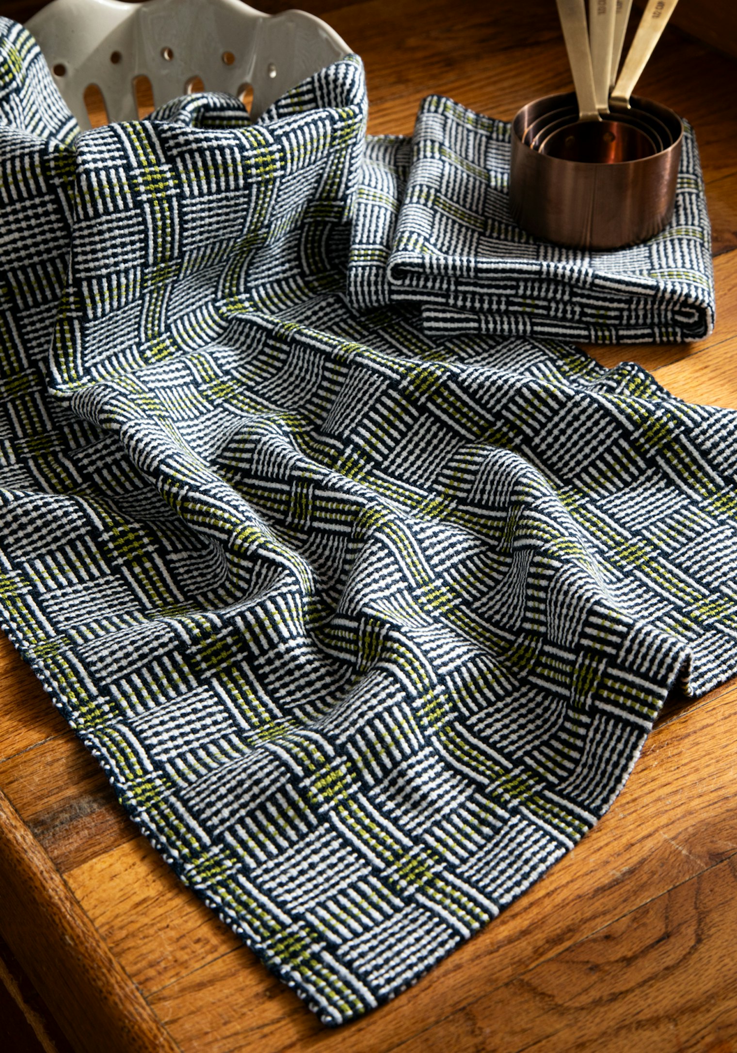 No two city streets are the same, and neither are these gorgeous Midtown Mosaic Towels by Connie LeTendresse. Blocks of black and white alternating with stripes of spring green make for a very sophisticated take on classic log cabin.
