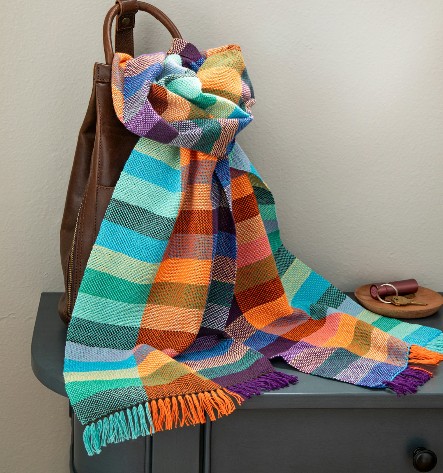 For her Urban Grid Scarf, designer Jennifer E. Kwong wanted to celebrate the bold and beautiful colors she found throughout the urban landscape.