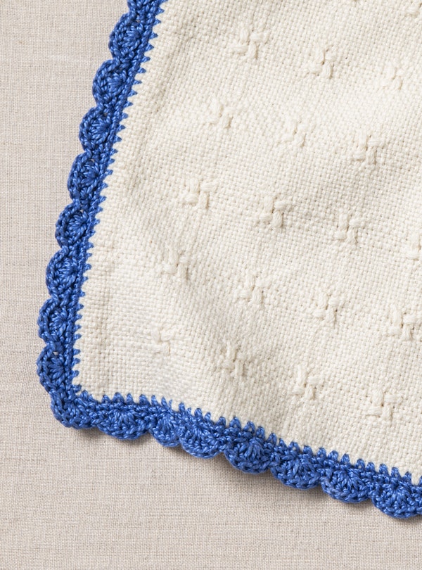 Use the shell stitch to create a decorative border and add more pizzazz; instructions below.