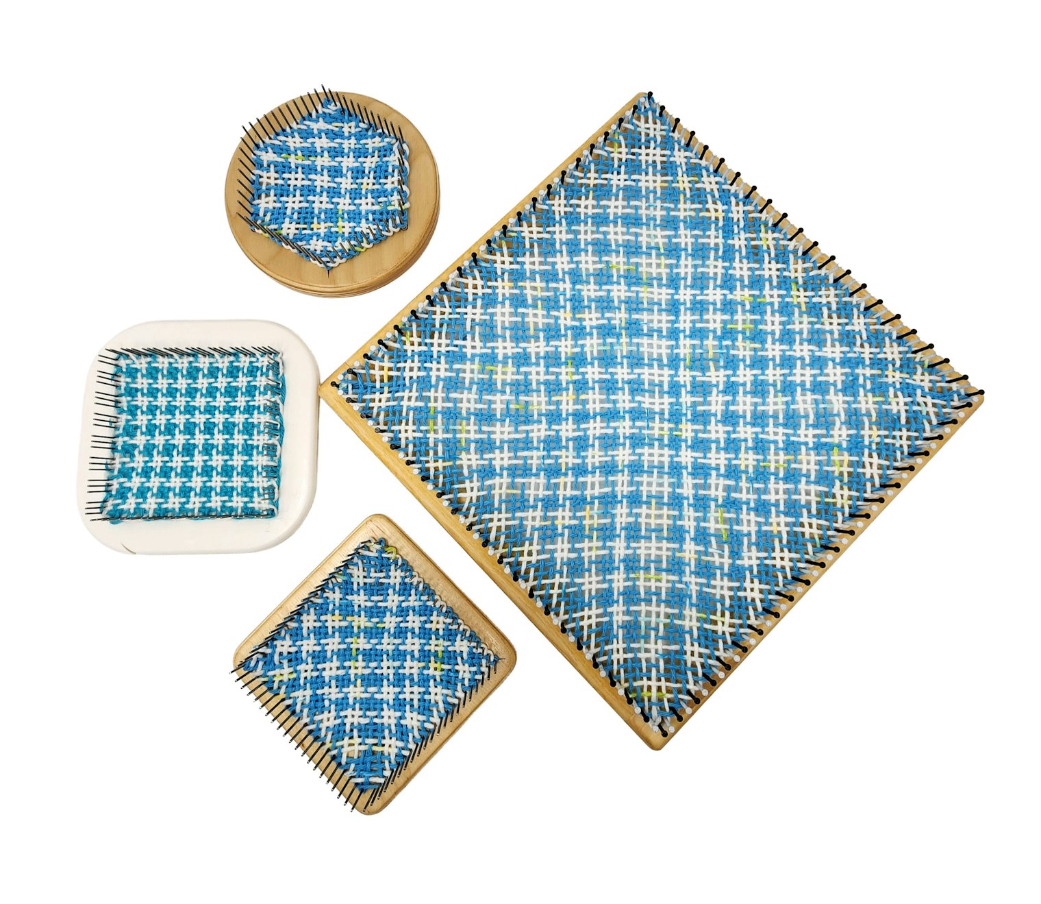 There are several shapes and types of looms shown here, including a 3-pin-style square and a hexagon loom. Photo by Gabi van Tassell