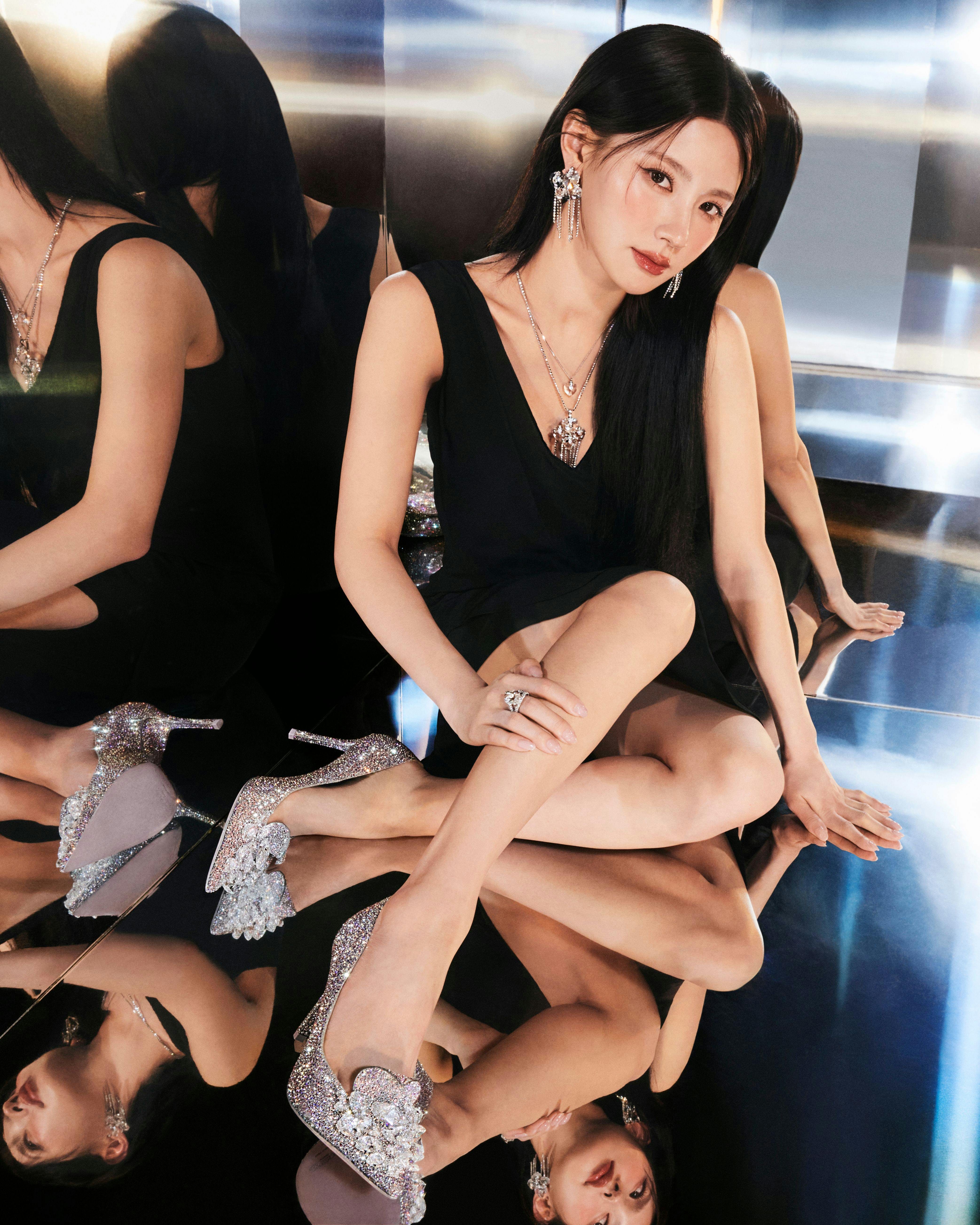 Discover the Jimmy Choo Crystal Slipper, a shoe covered in