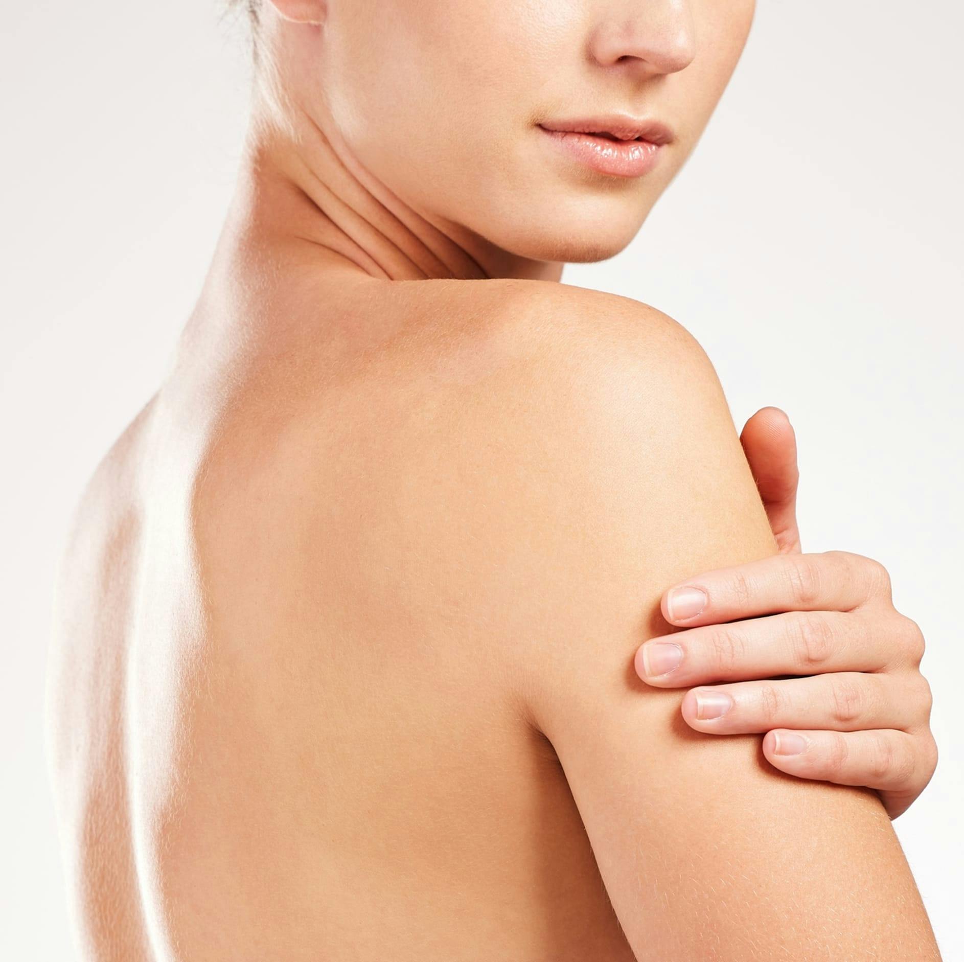 woman's bare back and arm