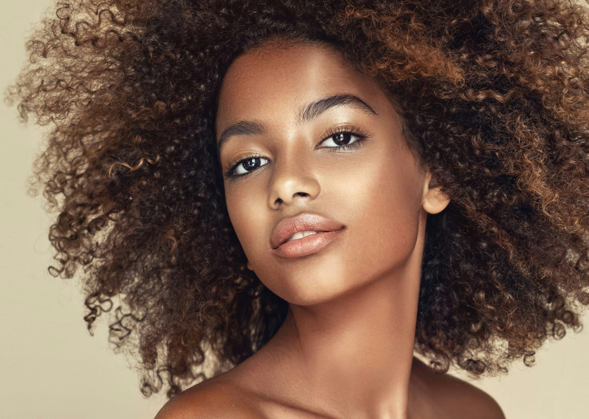woman with brown curly hair