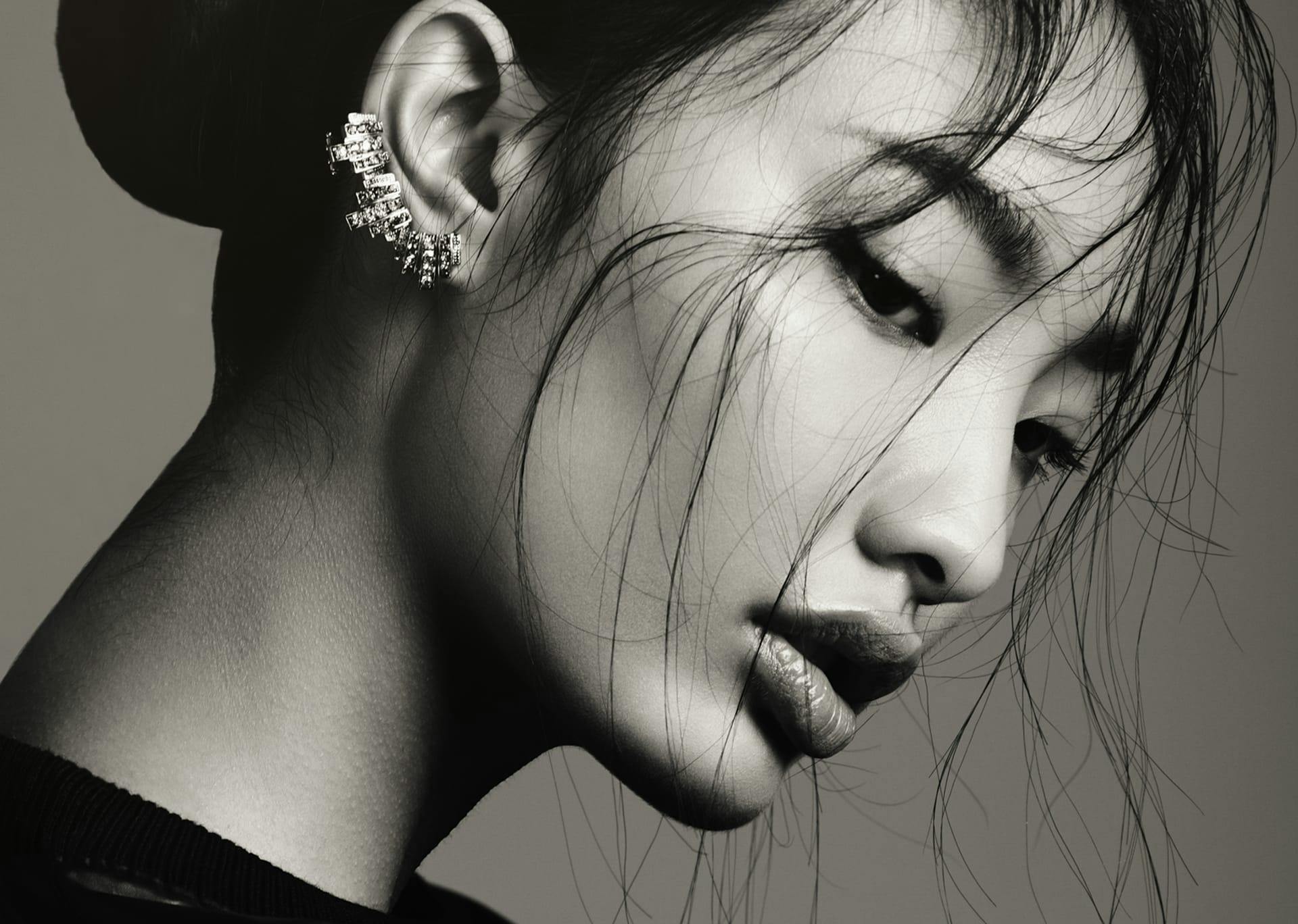 woman's profile with an earring on