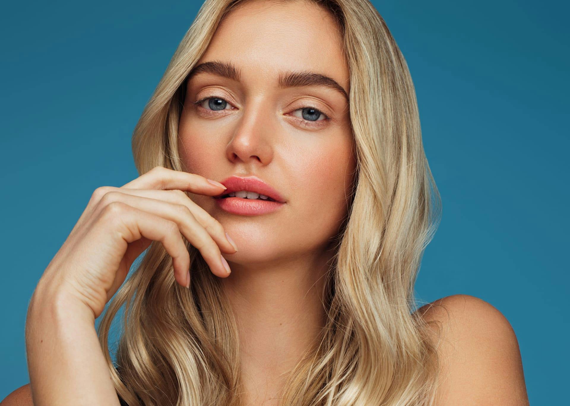 blonde woman with pink lips