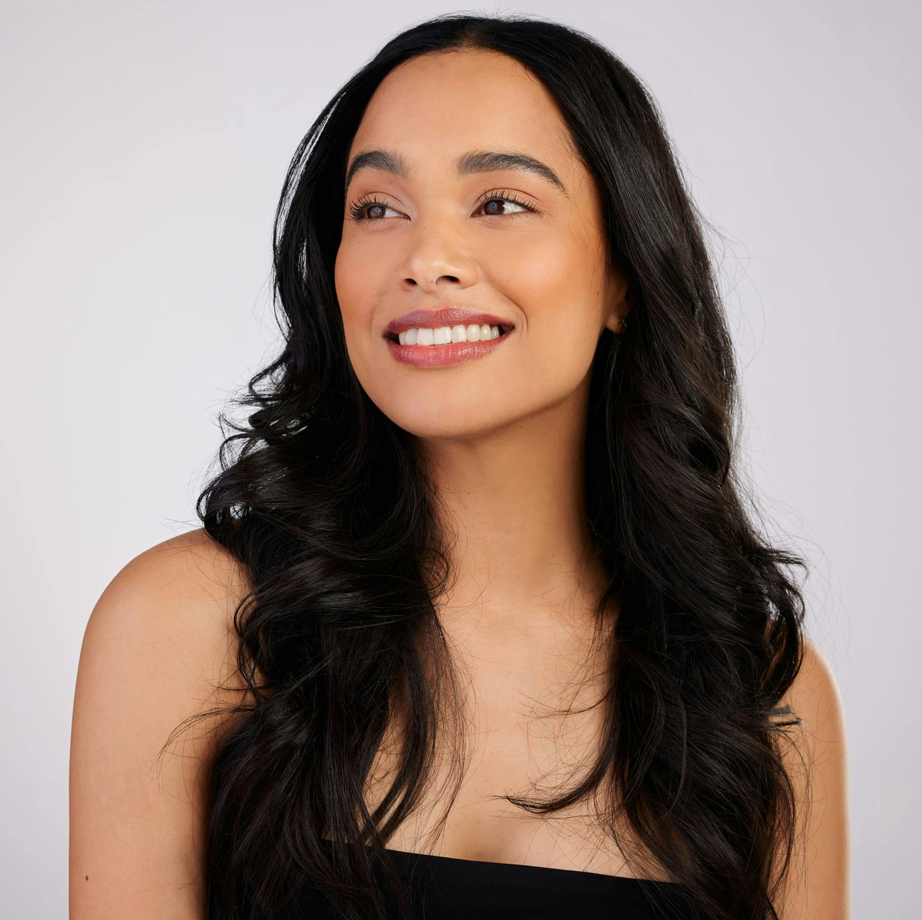 woman smiling with dark brown hair