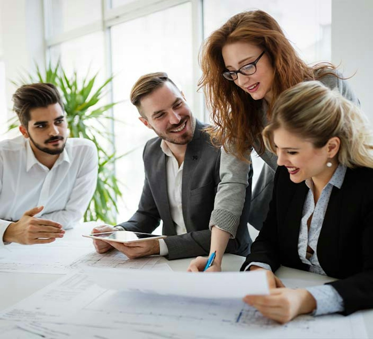 Female Project Manager working with team