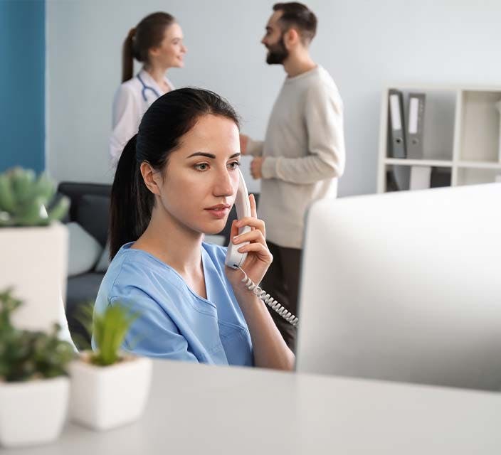 Medical Receptionist on phone