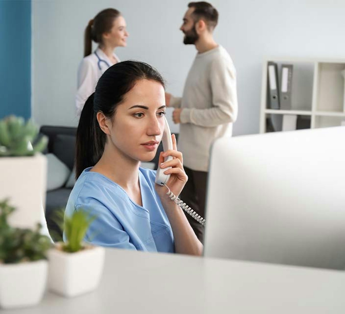 Medical Receptionist on phone 