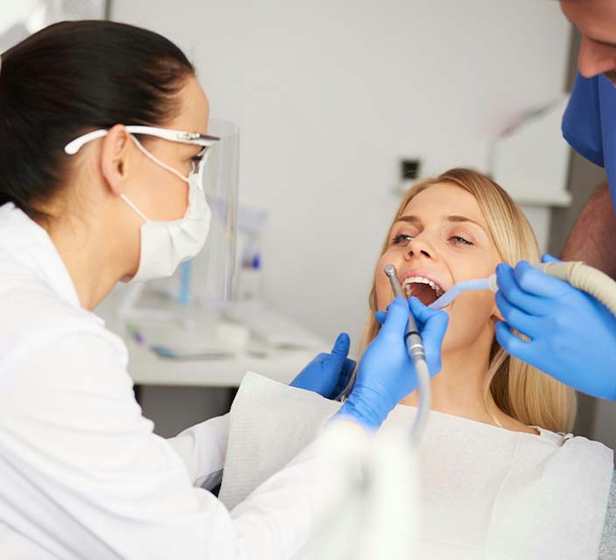 Dental Assistant helping Dentist with a procedure