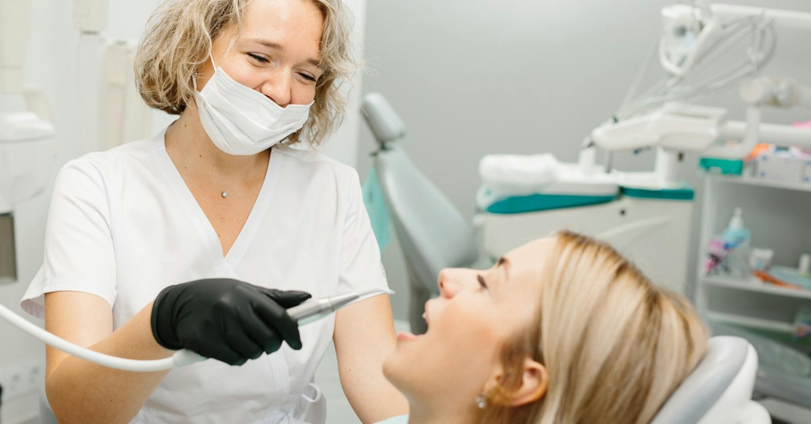 dental assistant and patient