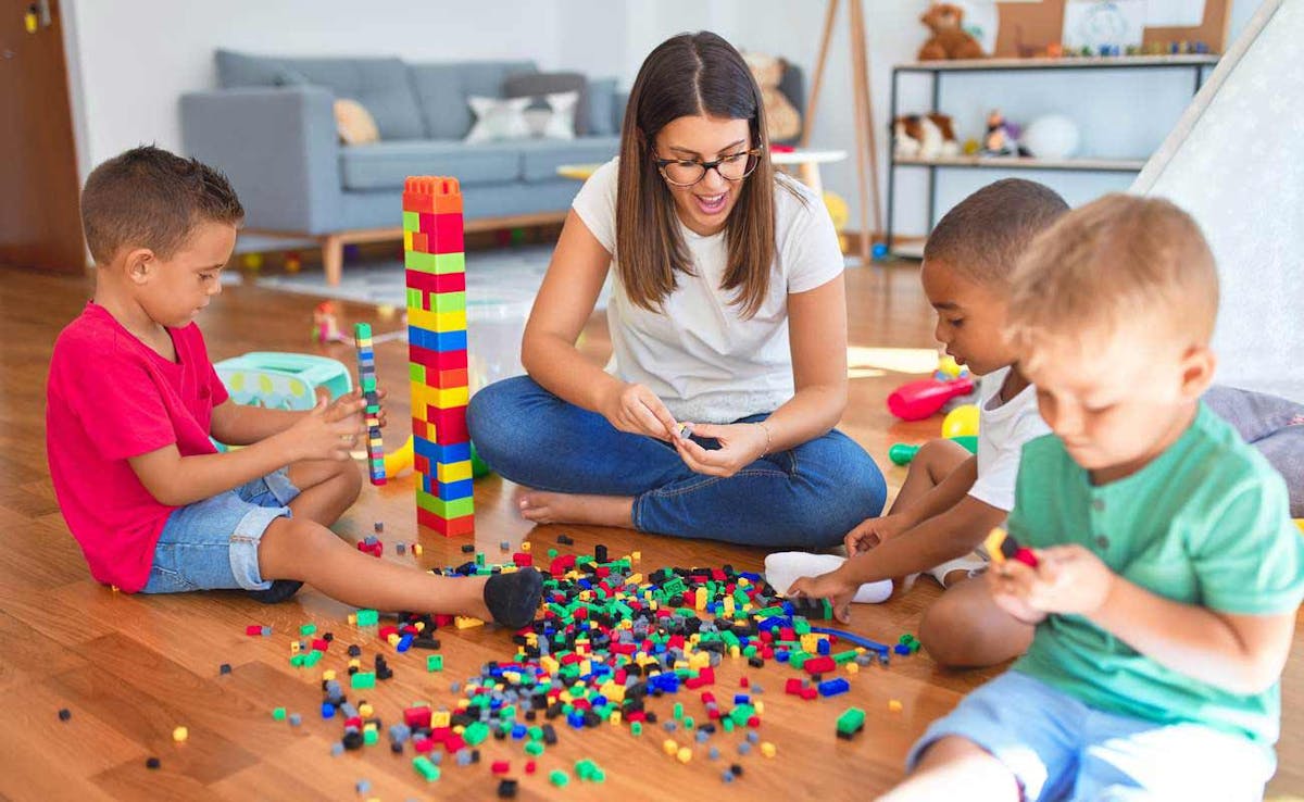 woman and children playing