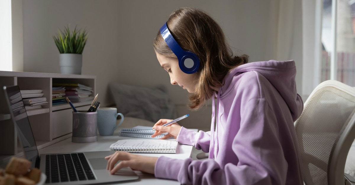 Girl studies at desk