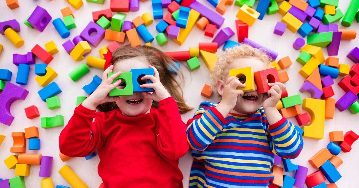 Students with ADHD playing amongst colourful blocks