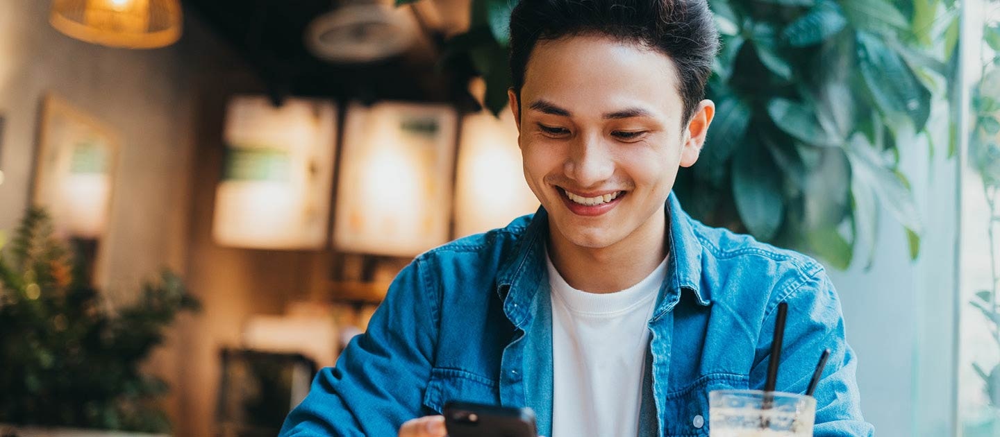 Man in cafe on phone