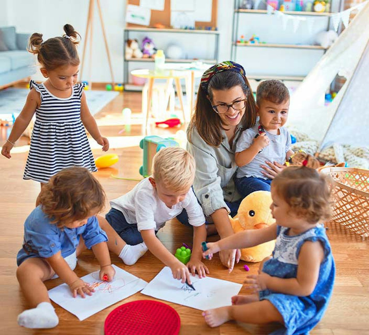 Family Day Care worker with children