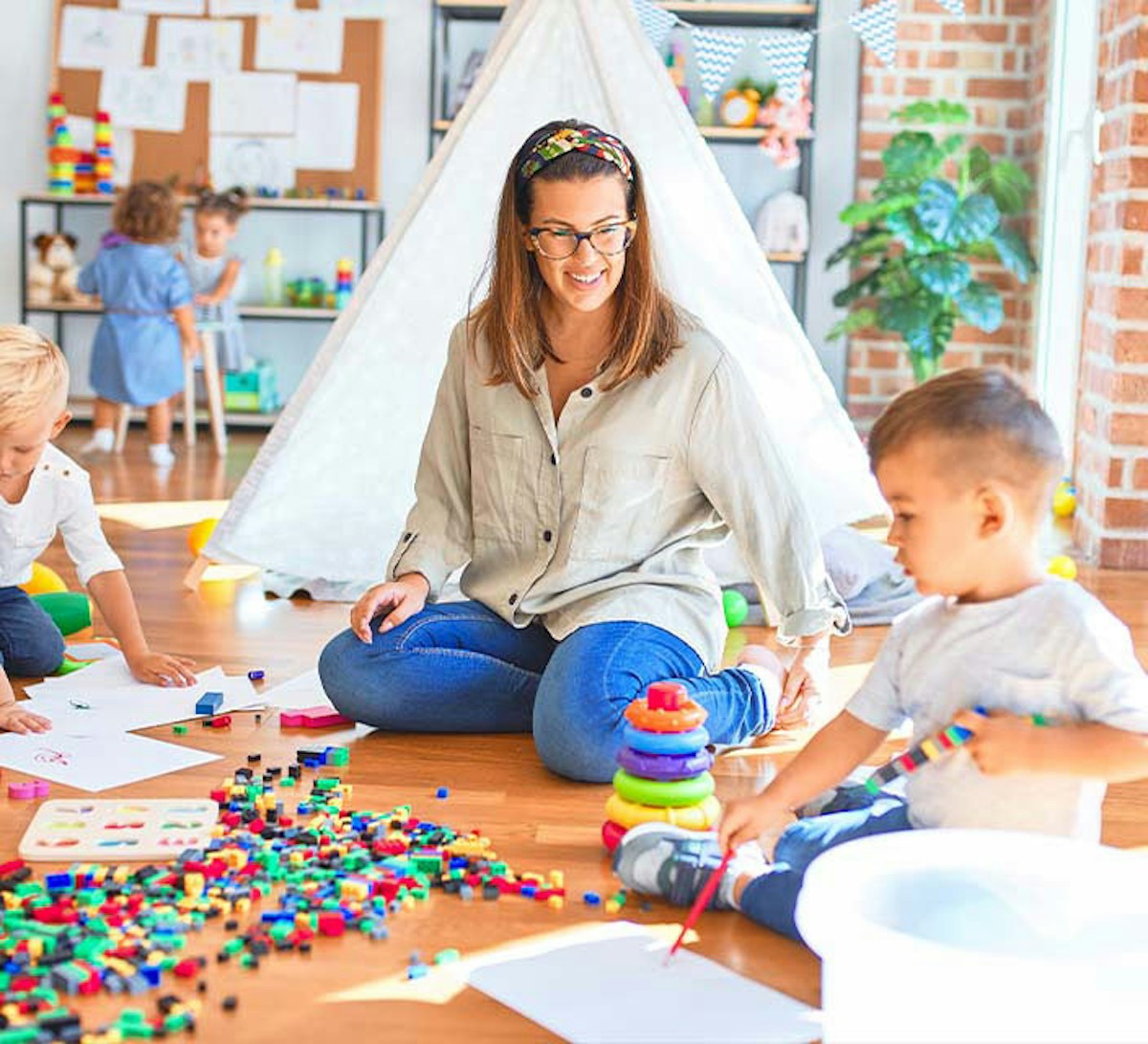 Childcare working with children in childcare centre