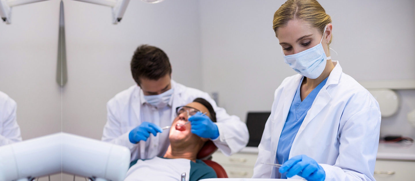 Dental Assistant Helping