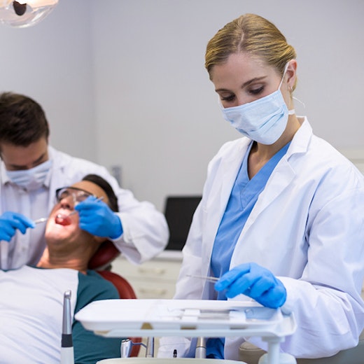 Dental Assistant Helping