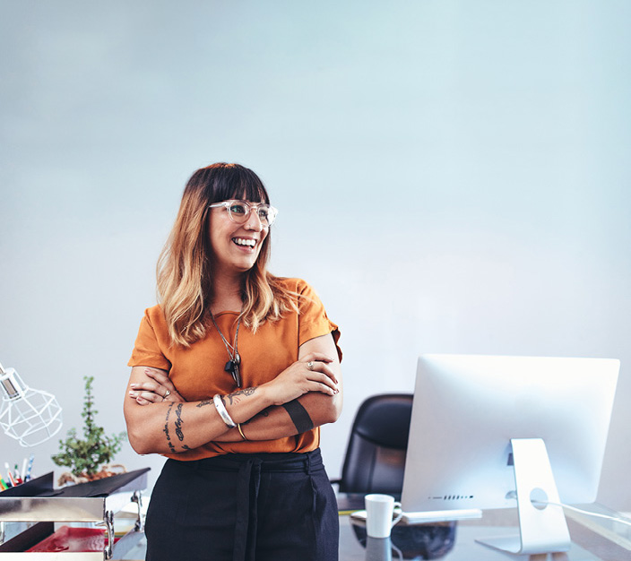 Smiling woman with computer