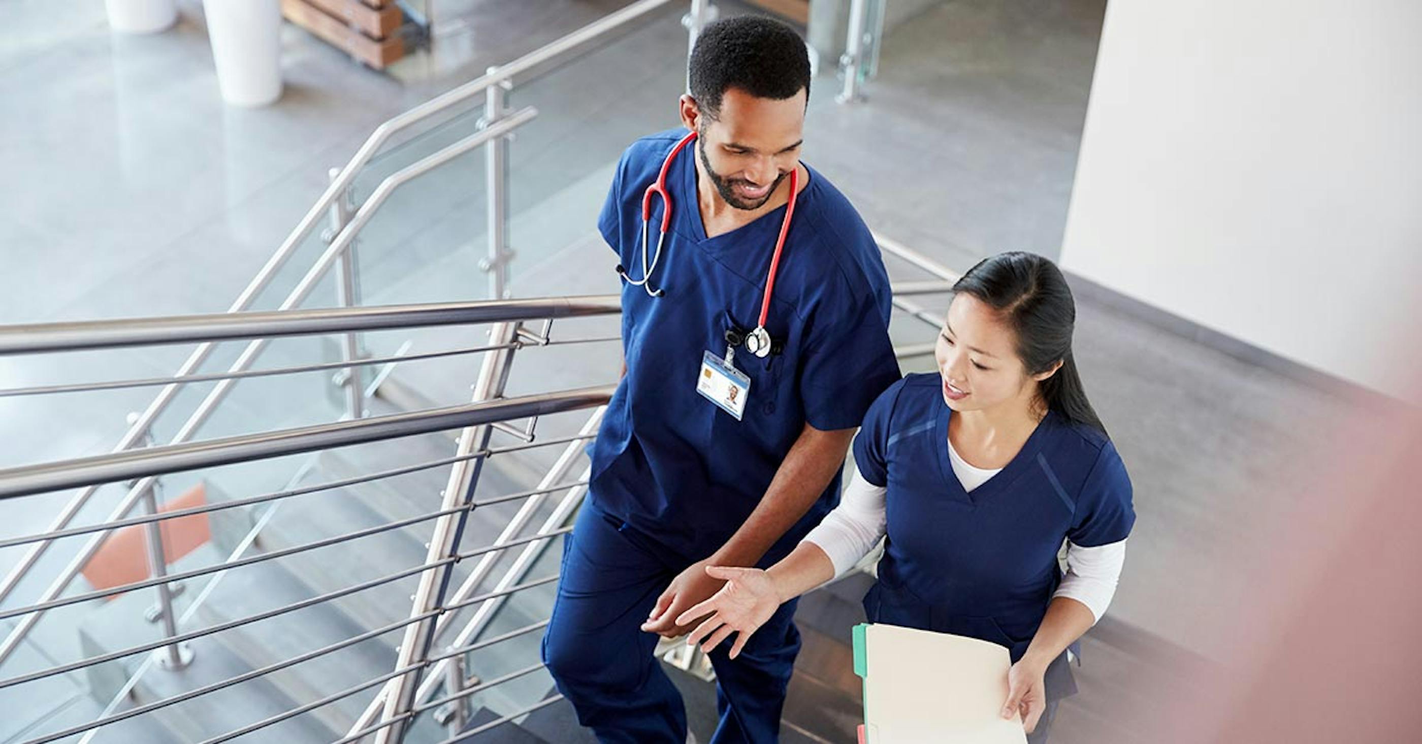 Allied health assistants walking up the stairs