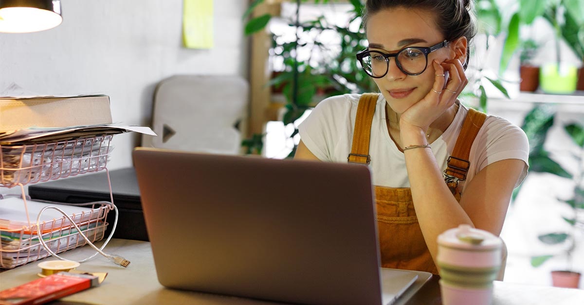 woman views computer