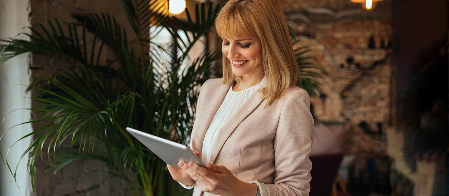 woman views tablet