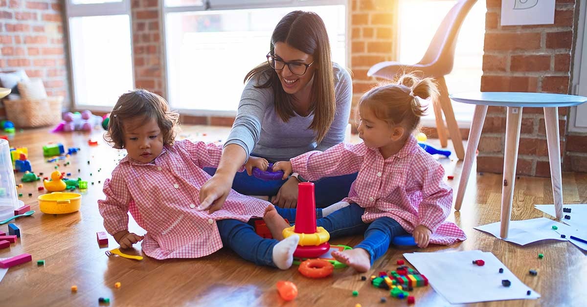 woman and children playing