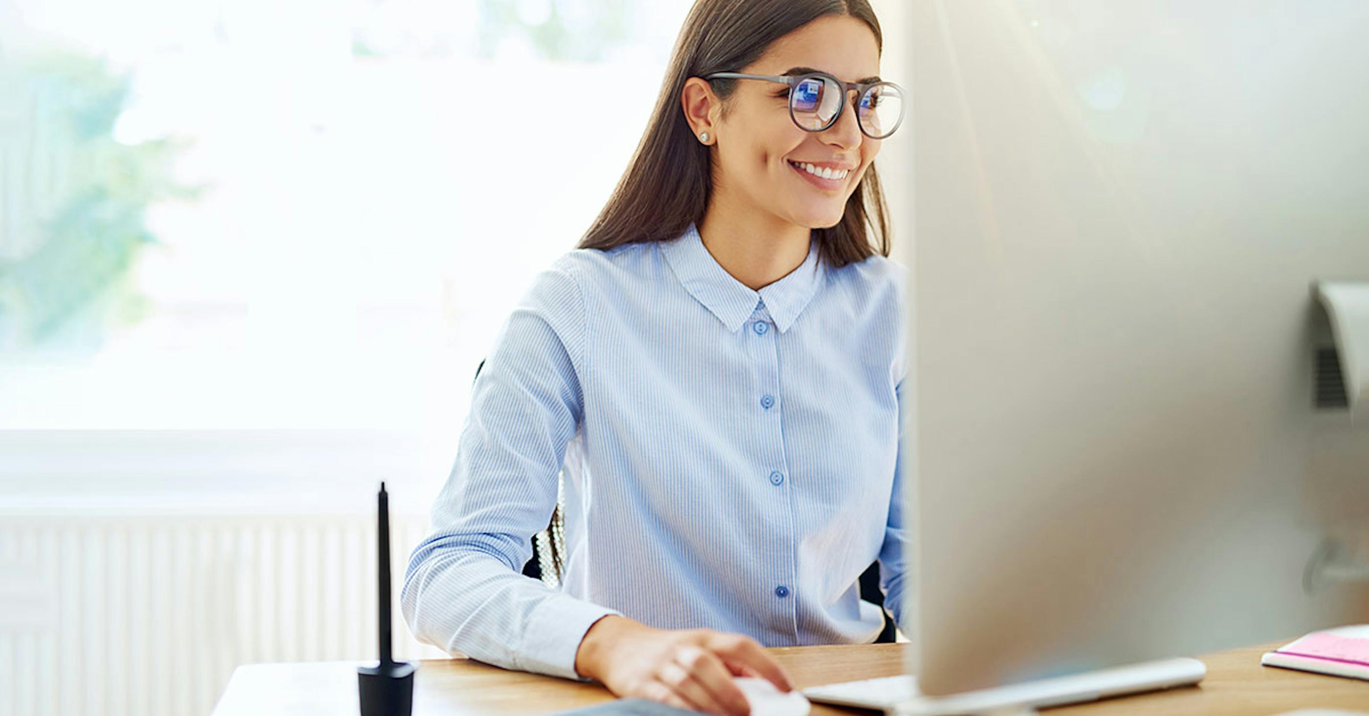 woman views computer