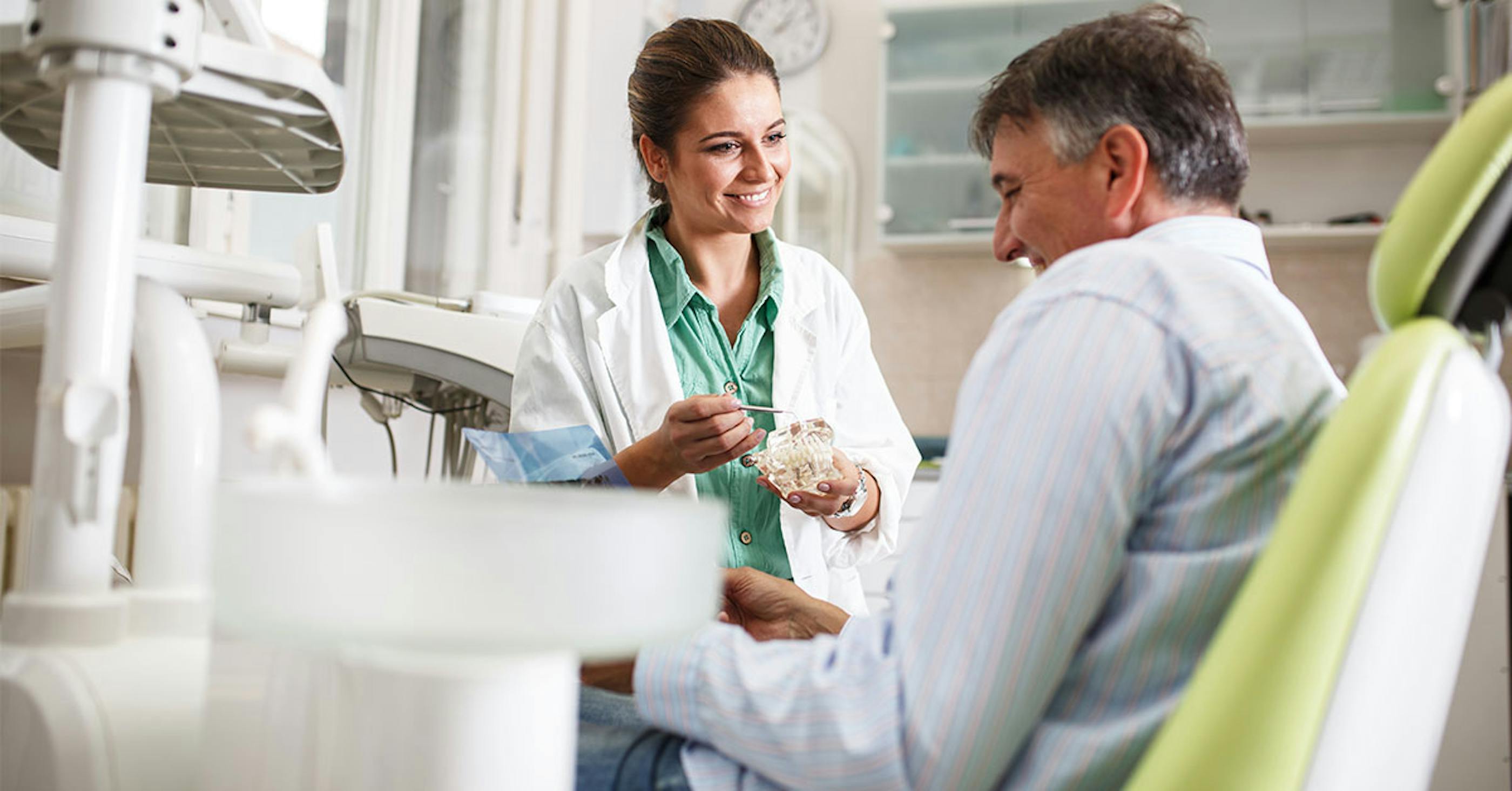 dental assistant and patient