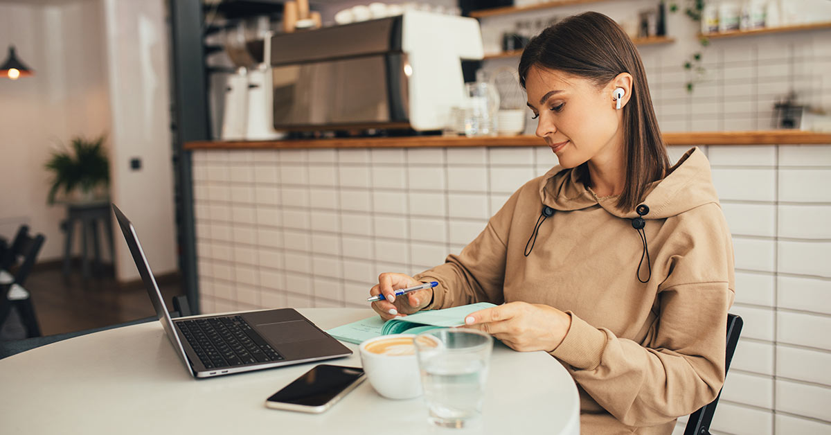 woman writes notes
