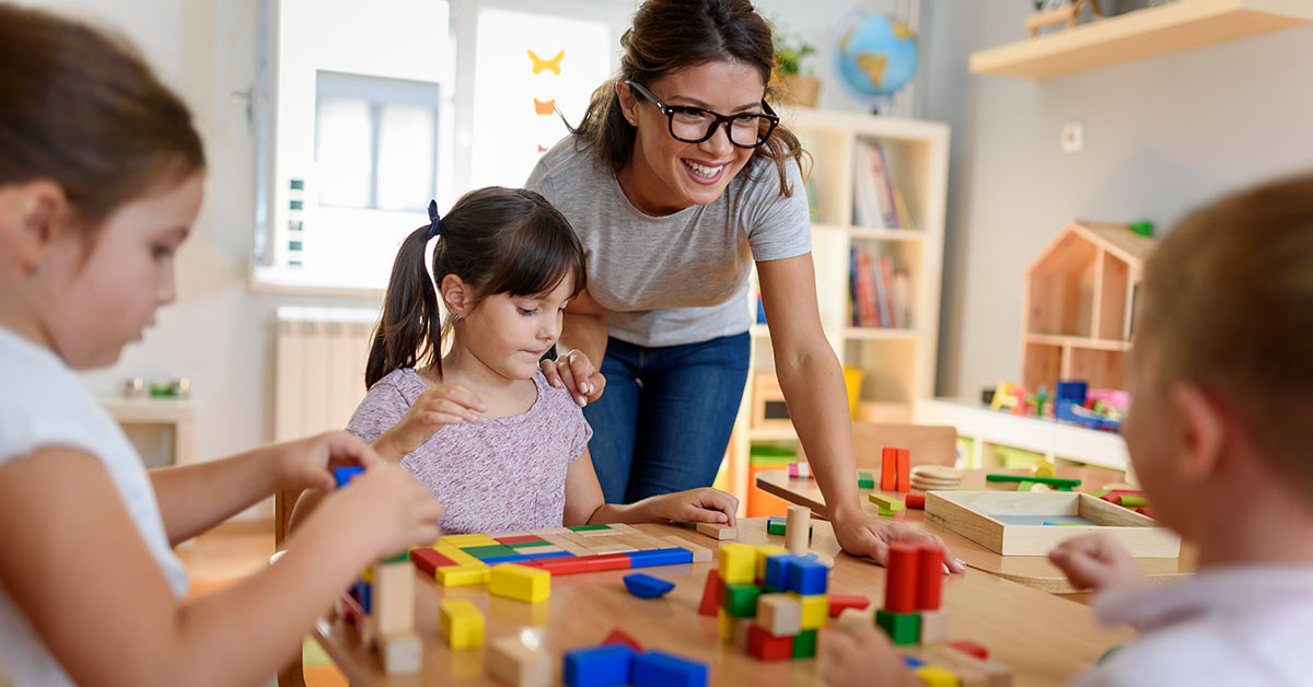 woman and children playing