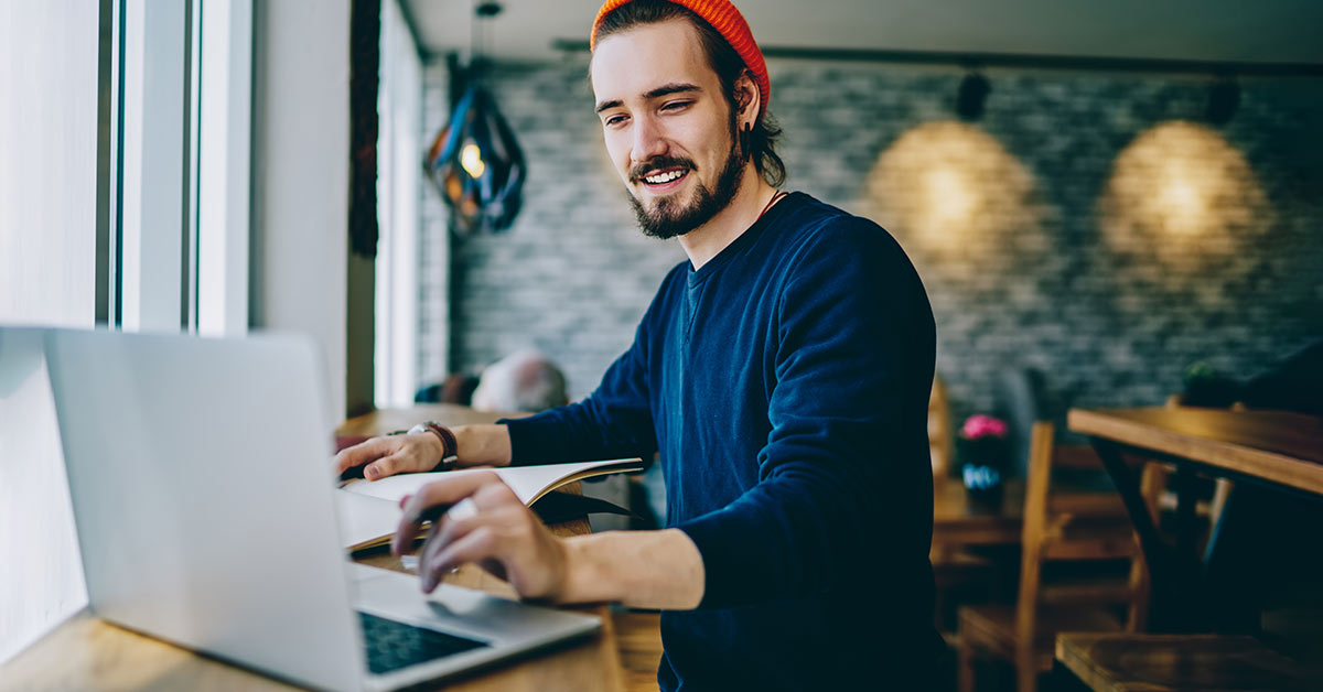 man views computer