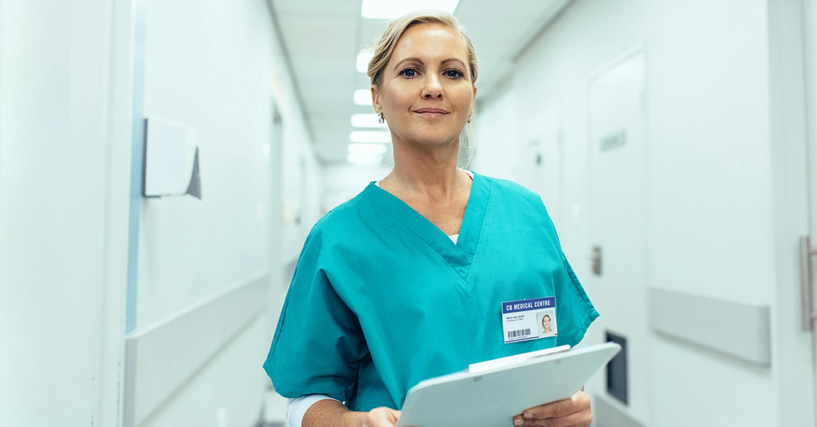 allied health assistant holds clipboard