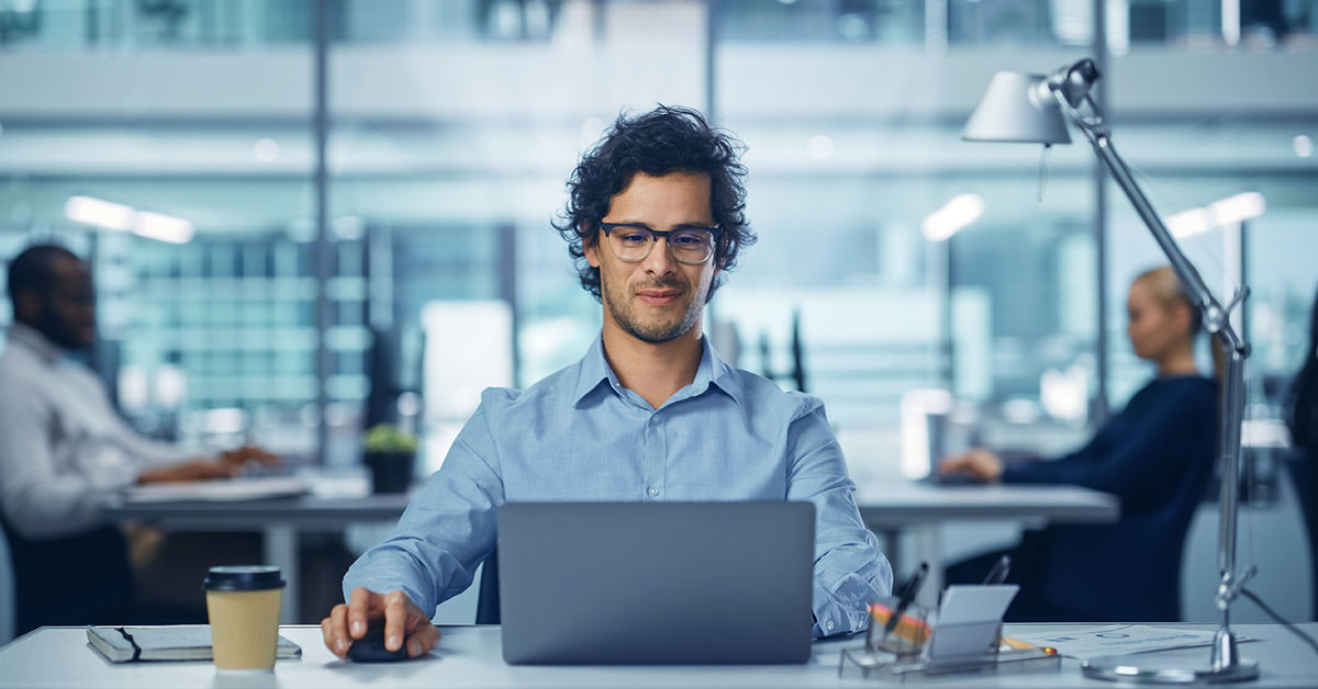 businessman views computer