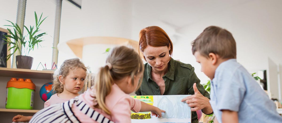 Childcare assistant with children