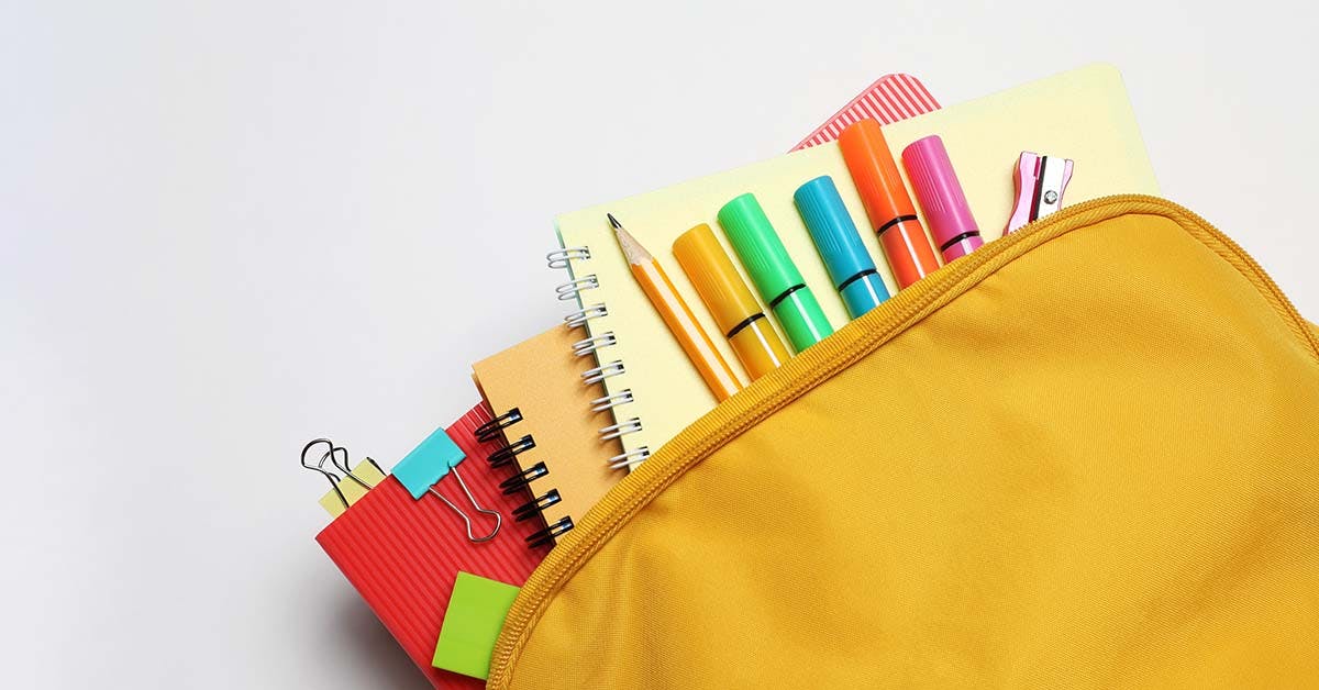 Backpack with different school stationery