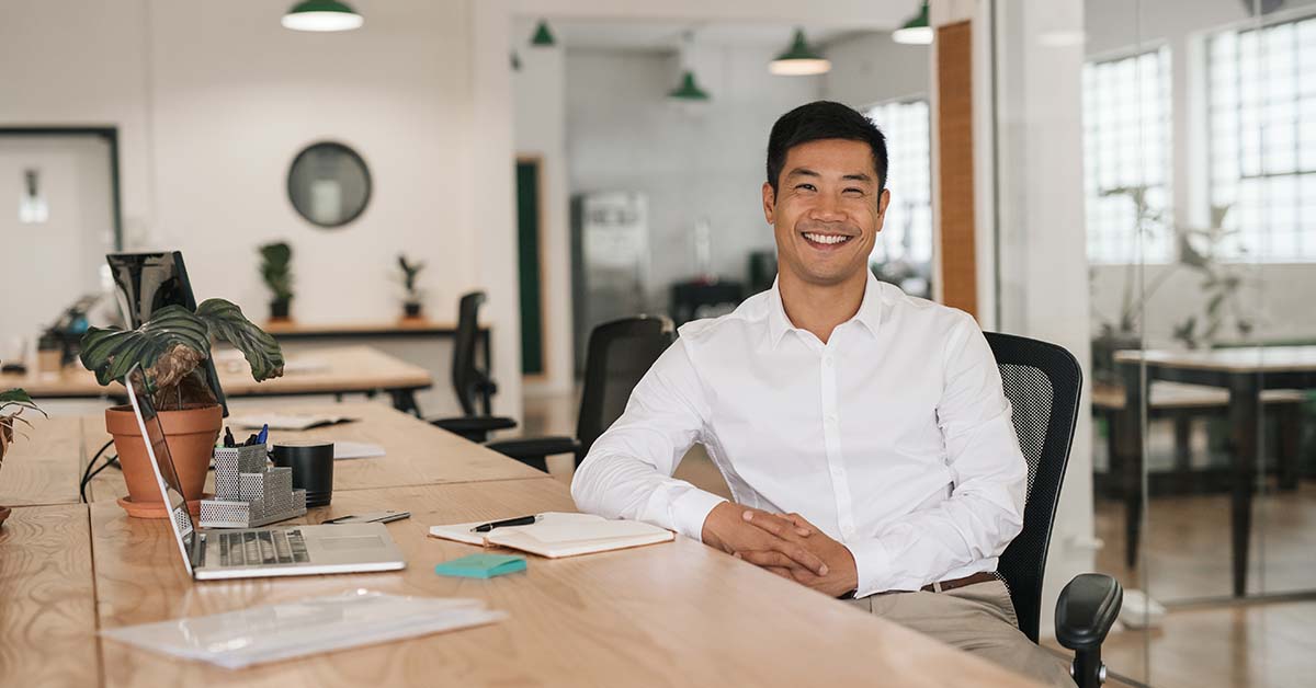 businessman sitting at his desk in an office